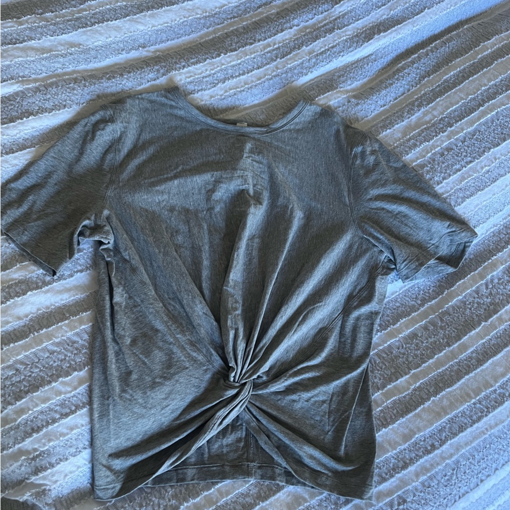 Lululemon top , NWOTs! Gray color, size 8 crop length